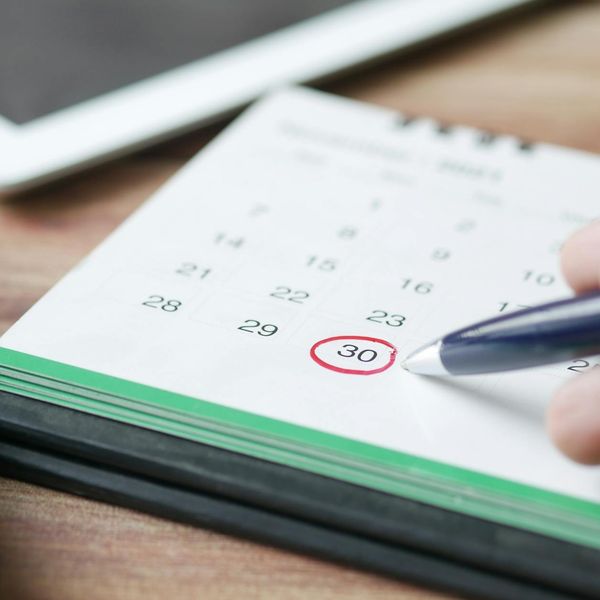 A simple calendar with a circle marked on a specific day, symbolizing routine.